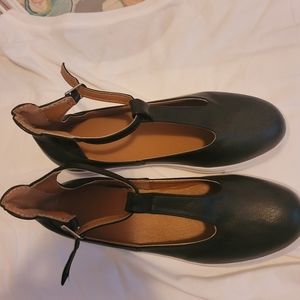 Black leather ankle strap shoes